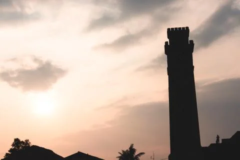 Sunset with clock tower gall sri lanka Foto stock