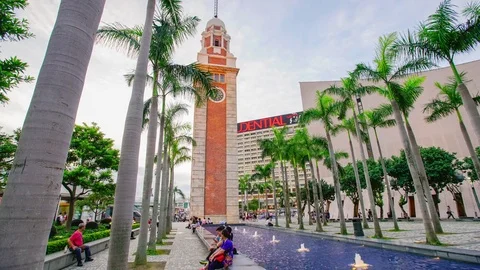 Sunset clock tower hyper lapse in Hong Kong Stock Footage 72768012