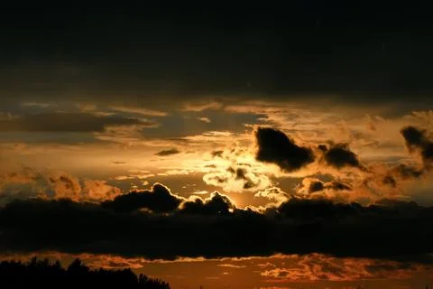 Sunset cloud dark Stock Photos