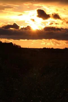 Sunset cloud dark Stock Photos