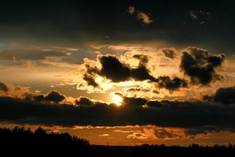 Sunset cloud dark Stock Photos