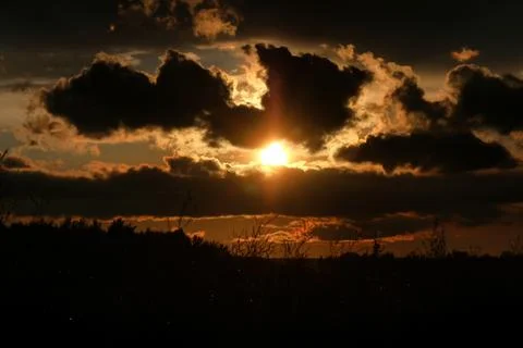Sunset cloud dark Stock Photos