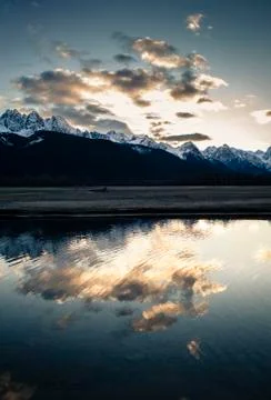 Sunset with cloud reflections Stock Photos