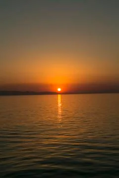 Sunset on a cloudless sky Stock Photos