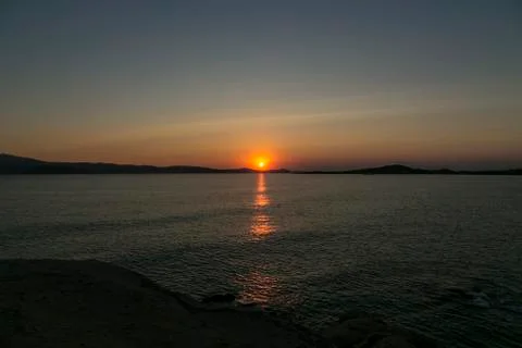 Sunset on a cloudless sky Stock Photos