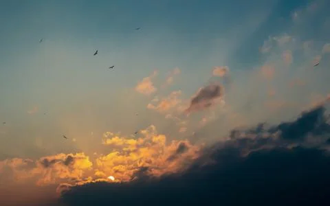 Sunset in the clouds above the Bay Stock Photos