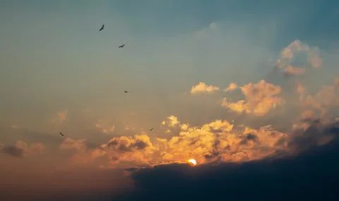 Sunset in the clouds above the Bay Stock Photos
