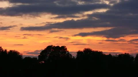 The sunset clouds above forest, time lapse Vidéo 11880664