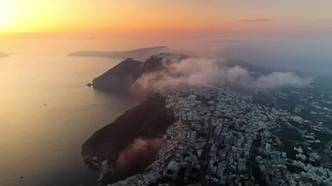 Sunset with clouds above Santorini 4K Stock Footage 314753900