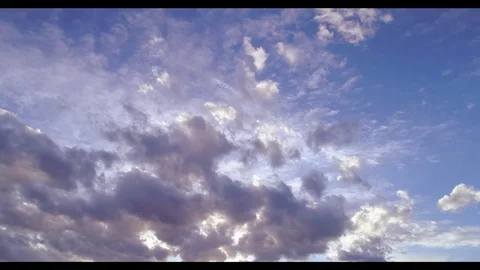 Sunset Clouds Aerial Tilt Down Stock Footage 73531520