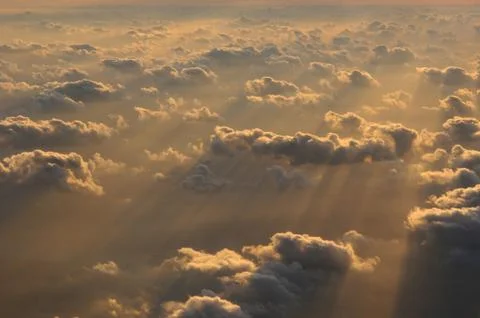 Sunset clouds and beams Stock Photos
