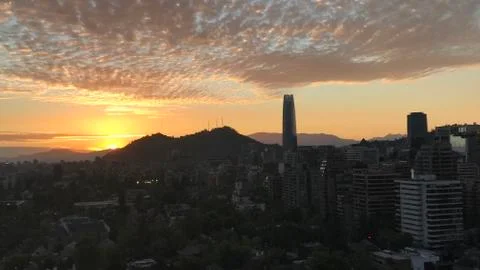 Sunset clouds and cityscape Stock Photos
