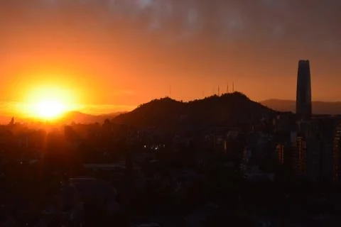 Sunset clouds and cityscape Stock-Fotos