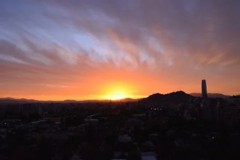 Sunset clouds and cityscape Stock Photos