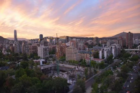 Sunset clouds and cityscape Stock Photos