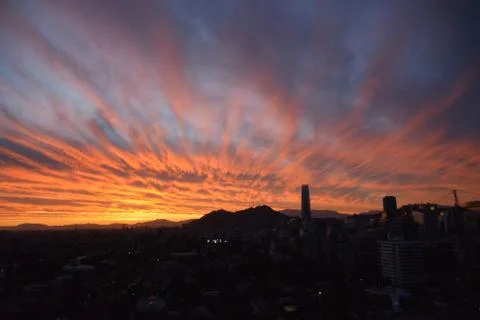 Sunset clouds and cityscape Foto stock
