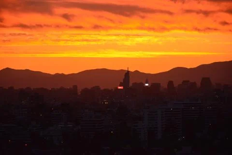 Sunset clouds and cityscape Stock Photos