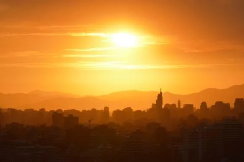 Sunset clouds and landscape Stock Photos