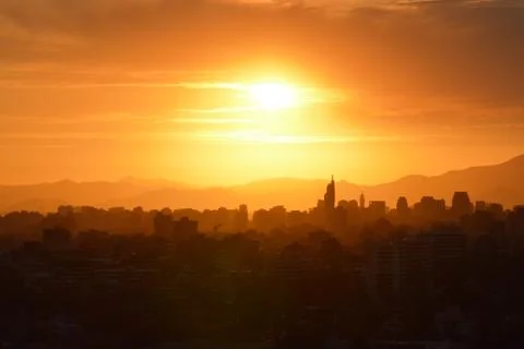 Sunset clouds and landscape Stock Photos