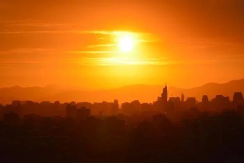 Sunset clouds and landscape Stock Photos