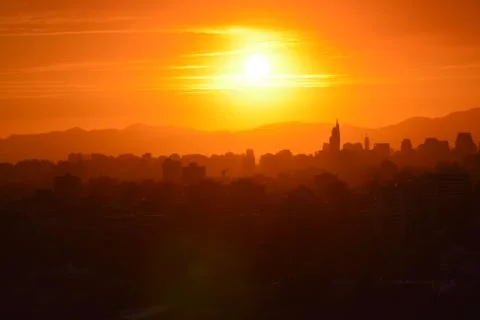 Sunset clouds and landscape 库存照片