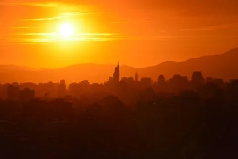 Sunset clouds and landscape Stock Photos