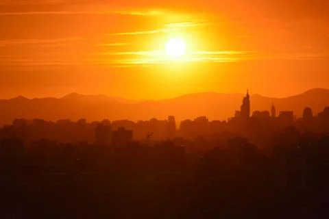 Sunset clouds and landscape Stock Photos