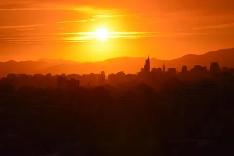 Sunset clouds and landscape Stock Photos