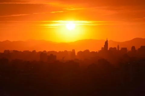 Sunset clouds and landscape Stock Photos