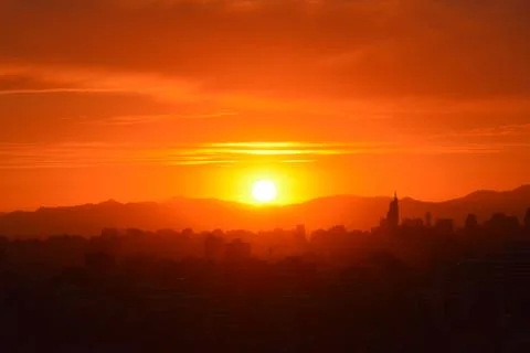 Sunset clouds and landscape Stock Photos