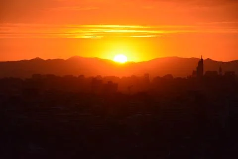 Sunset clouds and landscape Stock Photos