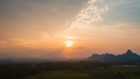 Sunset with clouds and mountain in countryside, time lapse Stock Footage 87738851