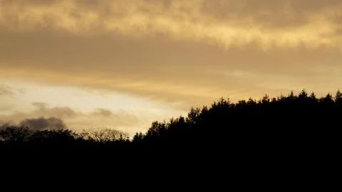 Sunset clouds and mountains Stock Photos