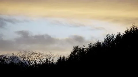 Sunset clouds and mountains Stock Photos