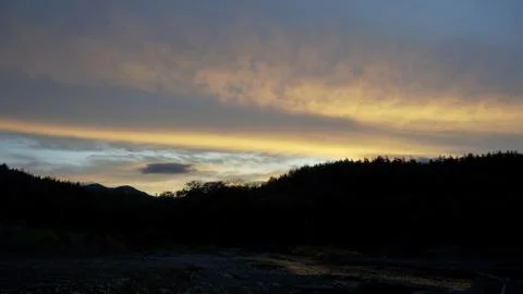 Sunset clouds and mountains Foto stock