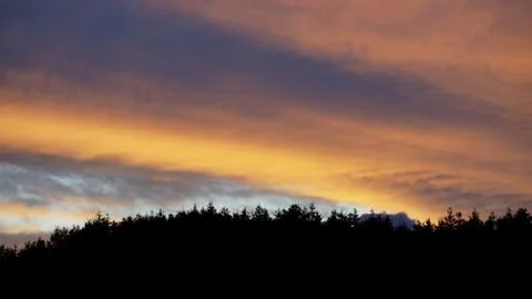 Sunset clouds and mountains Foto stock