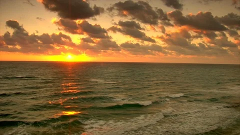 Sunset. Clouds and ocean waves view from beach. pan B Stock Footage 102532279