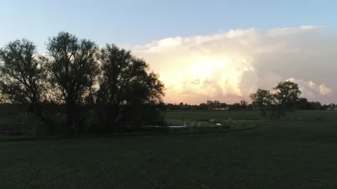 Sunset clouds and sky- Drone camera moves forwrd and right Stock Footage 137859699