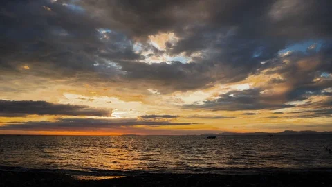 Sunset clouds and sparlking water Stock Footage 88844652