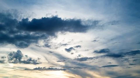Sunset Clouds background. Dramatic Clouds Sunset Background. Sky with clouds in Stock Photos