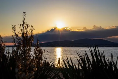 Sunset in clouds on the background of the sea and mountains in Gelendzhik 스톡 사진