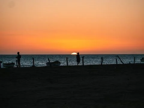 Sunset clouds beach Stock Photos