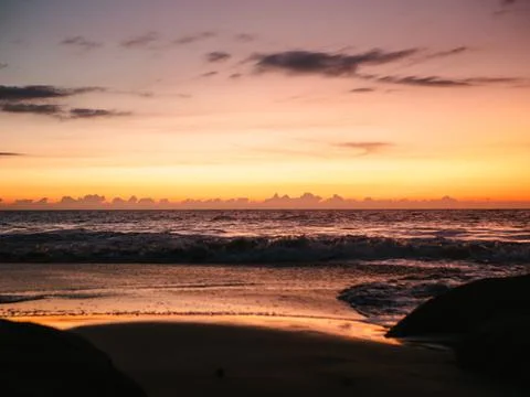 Sunset clouds beach Stock Photos