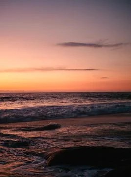 Sunset clouds beach Stock Photos