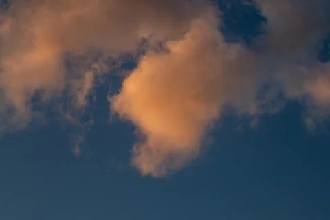 Sunset Clouds in a Blue Sky Stockfoto's