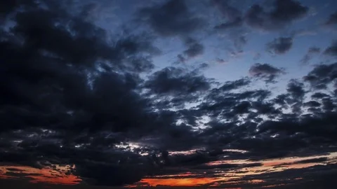 Sunset Clouds. Dark blue orange. Sunset sky Stock-Footage 84333041