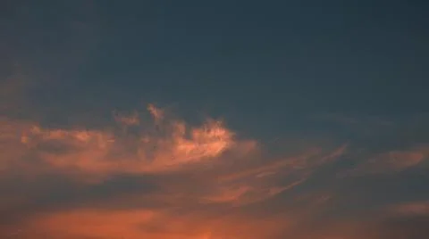Sunset Clouds in Deep Blue Sky Stock Photos
