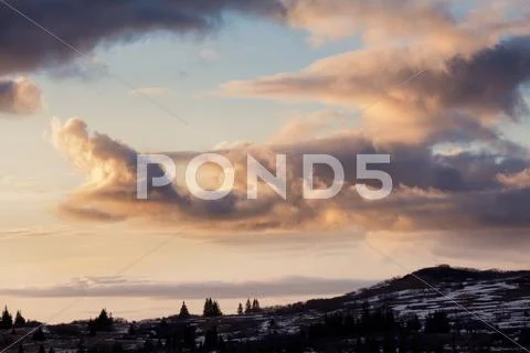 Sunset clouds in early spring Stock Photos