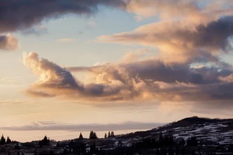 Sunset clouds in early spring Stock Photos