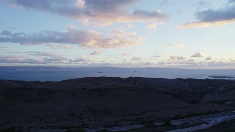 Sunset clouds float over Gibraltar Stock Footage 231474042
